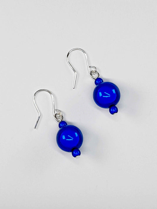 Handmade Silver Dangle Earrings with Blue Luminescent Beads