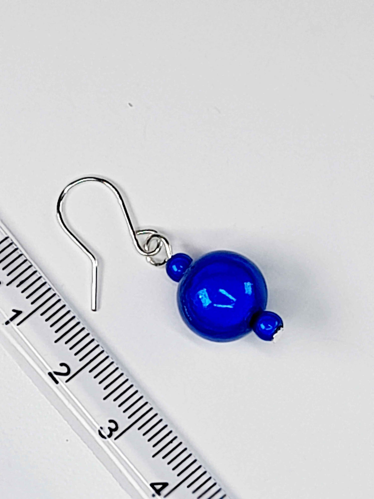Handmade Silver Dangle Earrings with Blue Luminescent Beads