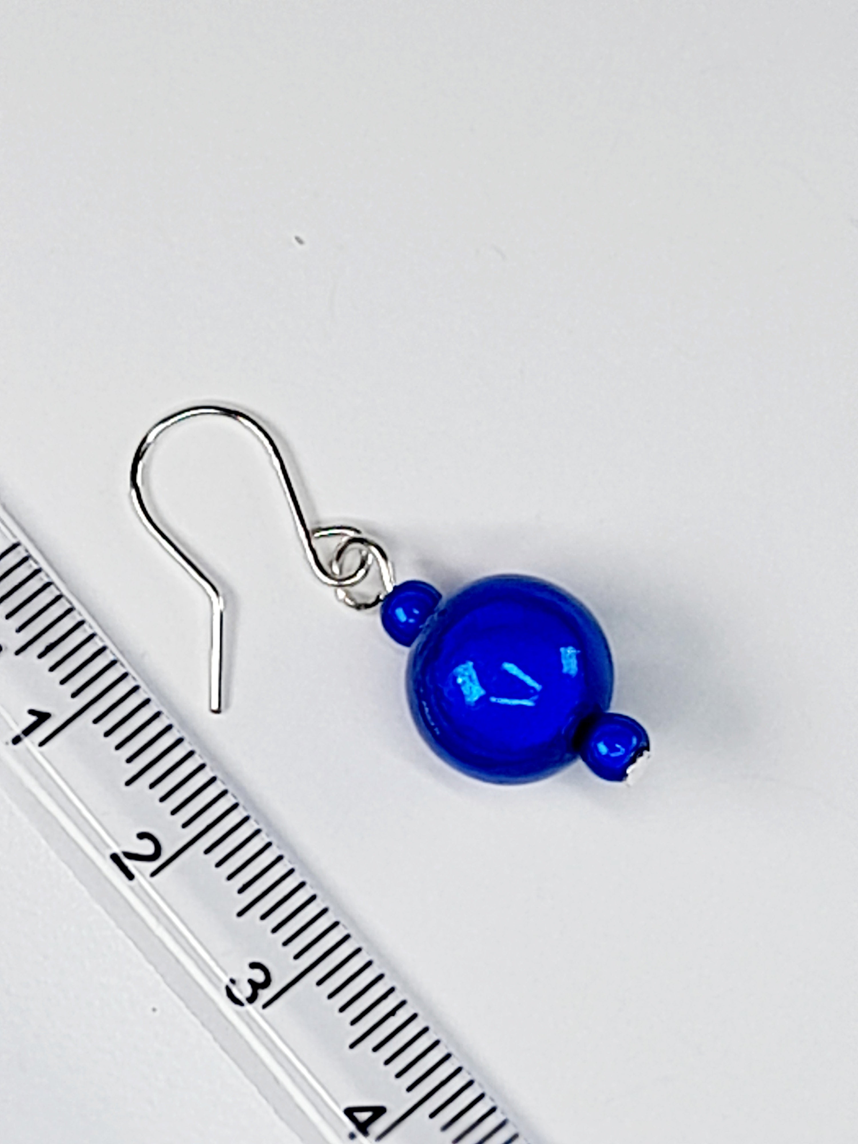 Handmade Silver Dangle Earrings with Blue Luminescent Beads
