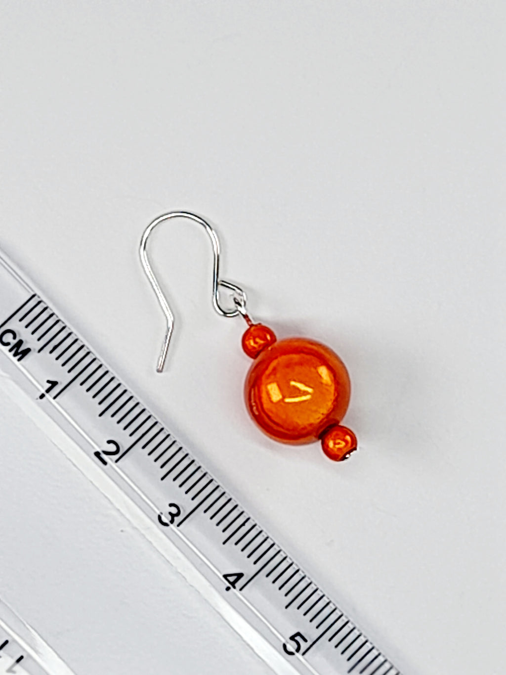 Handmade Silver Dangle Earrings with Orange Luminescent Beads