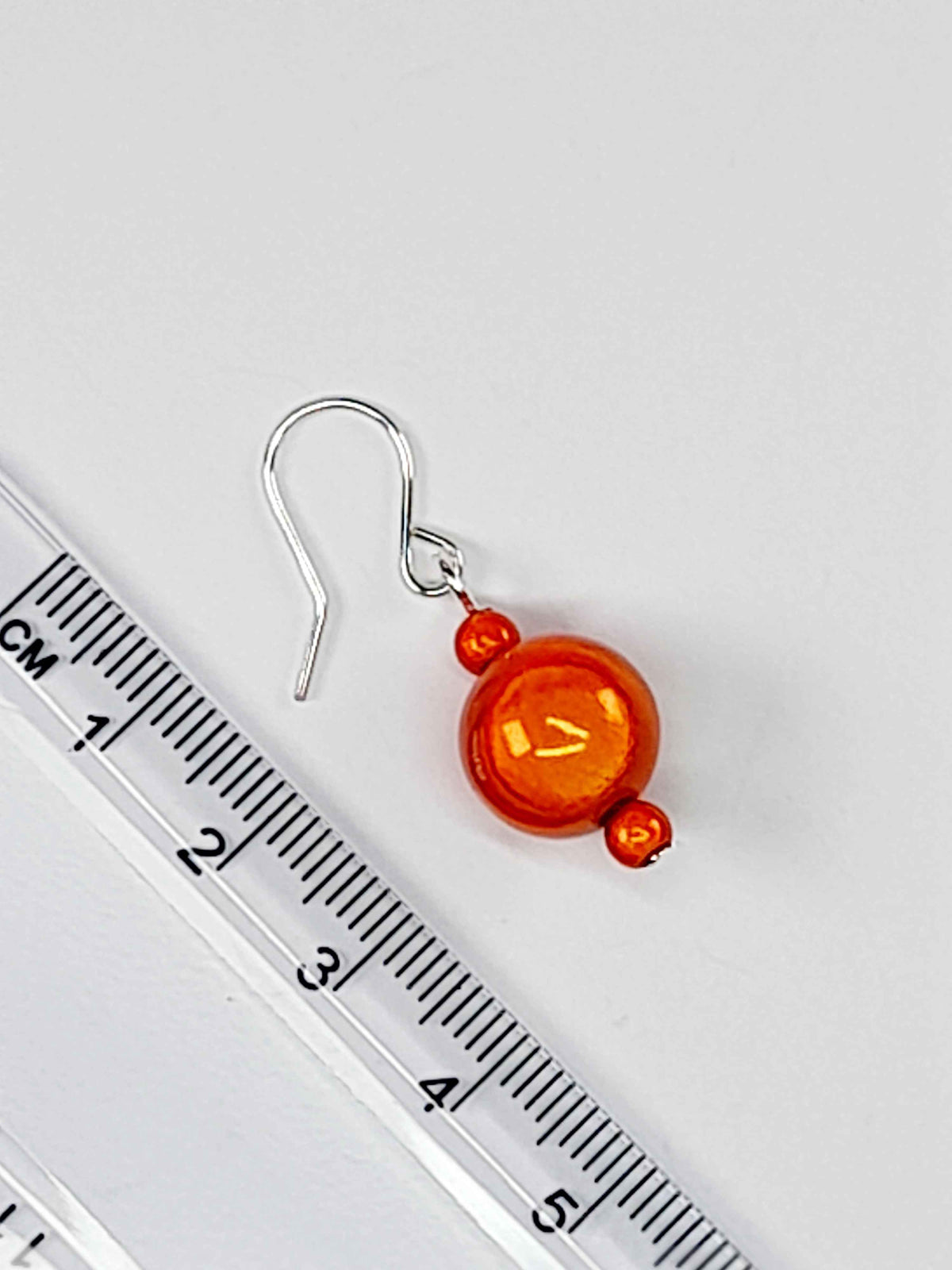 Handmade Silver Dangle Earrings with Orange Luminescent Beads