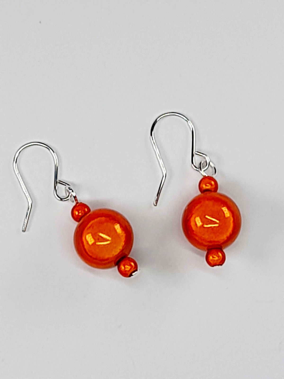 Handmade Silver Dangle Earrings with Orange Luminescent Beads