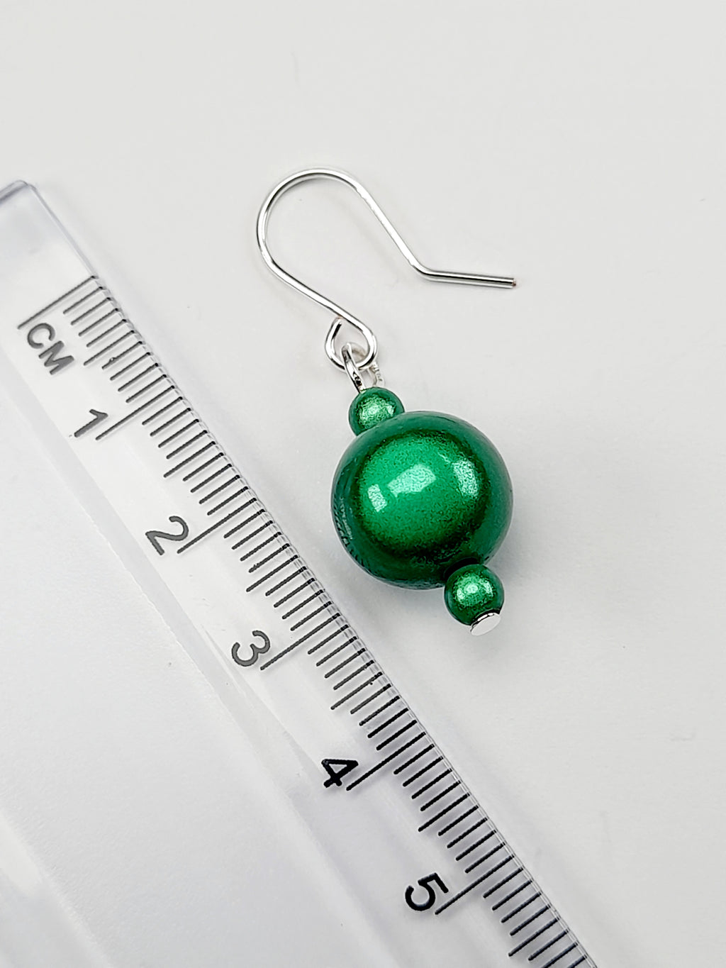 Handmade Silver Dangle Earrings with Green Luminescent Beads
