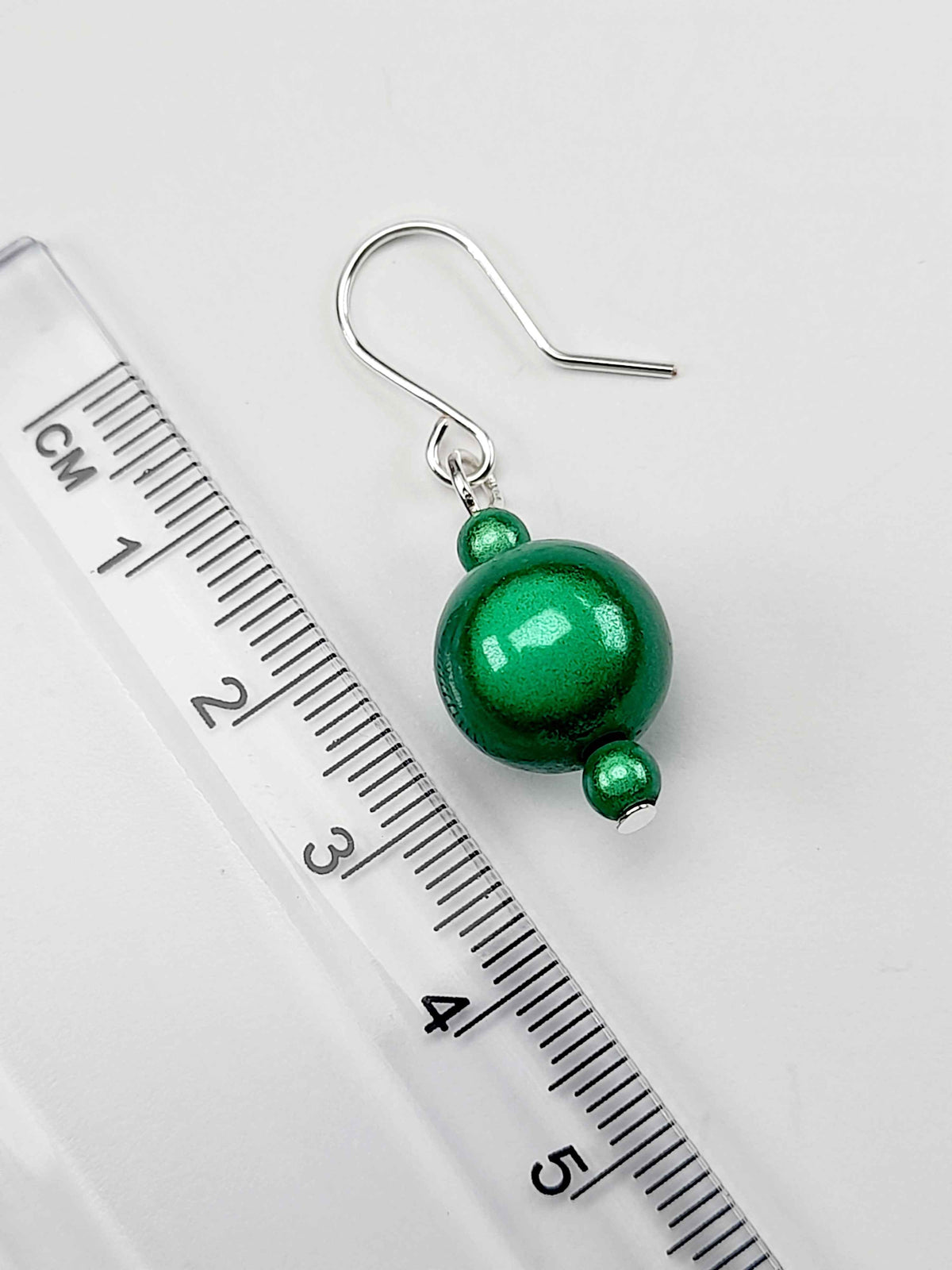 Handmade Silver Dangle Earrings with Green Luminescent Beads