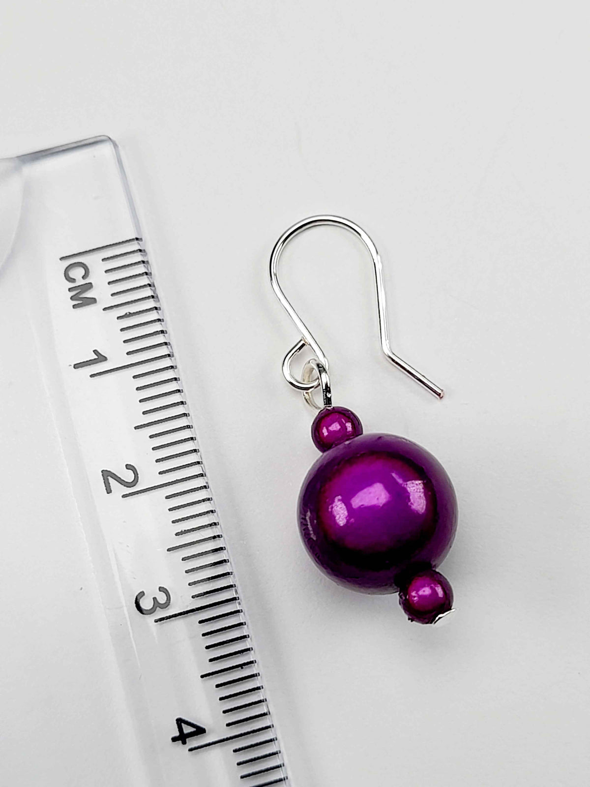 Handmade Silver Dangle Earrings with Purple Luminescent Beads