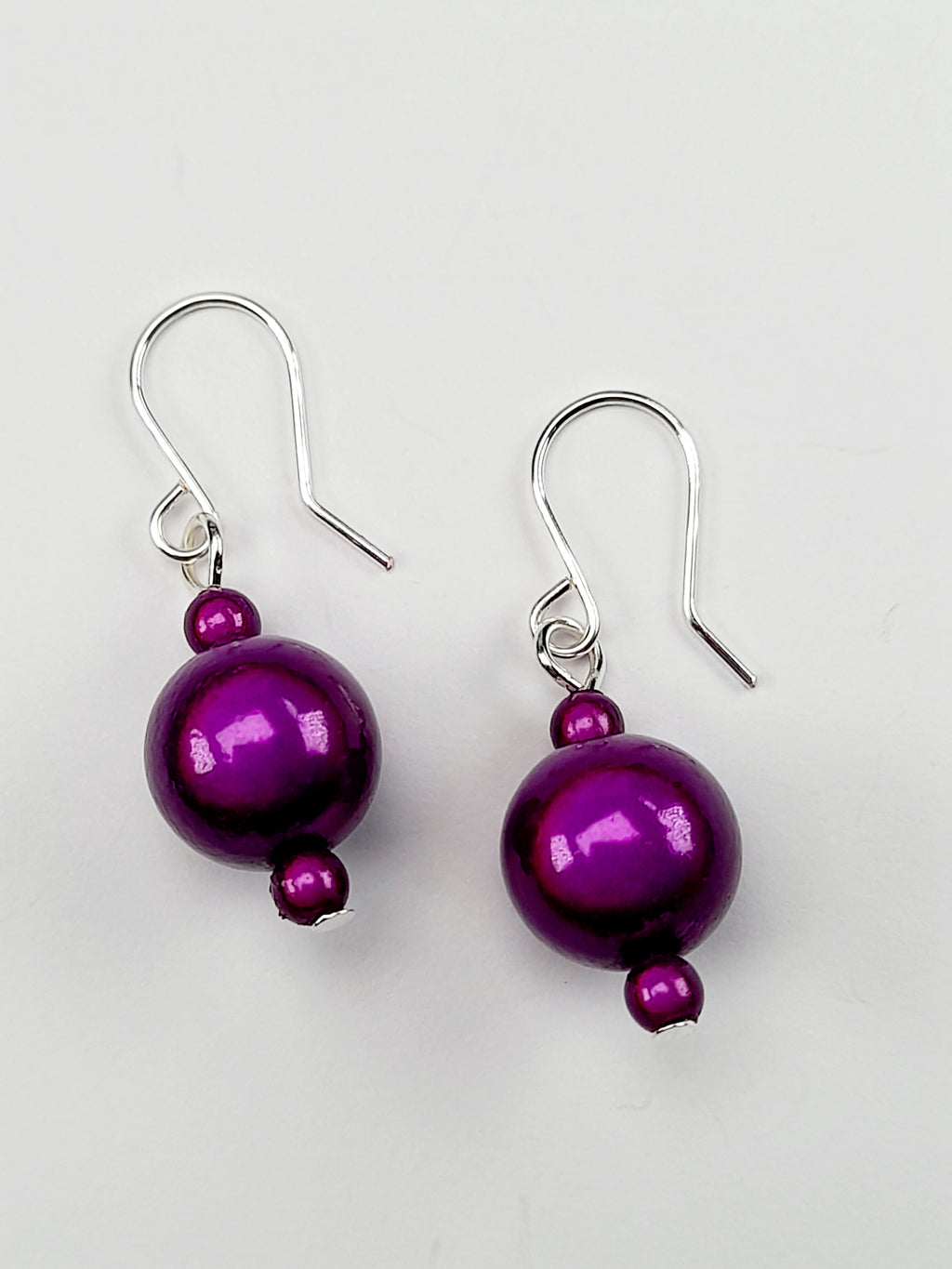 Handmade Silver Dangle Earrings with Purple Luminescent Beads