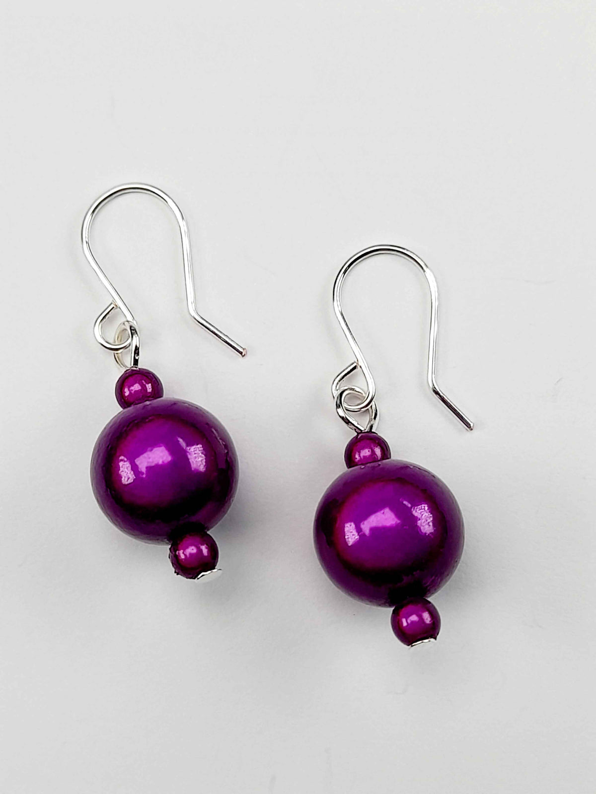 Handmade Silver Dangle Earrings with Purple Luminescent Beads