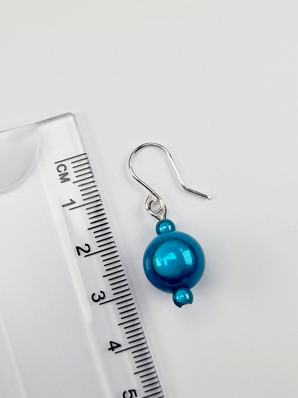 Handmade Silver Dangle Earrings with Turquoise Luminescent Beads