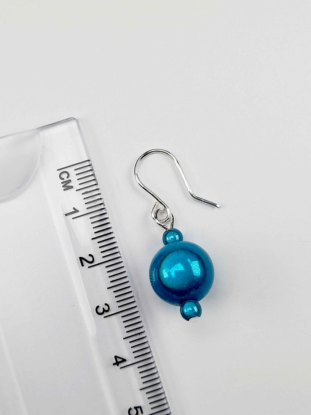 Handmade Silver Dangle Earrings with Turquoise Luminescent Beads