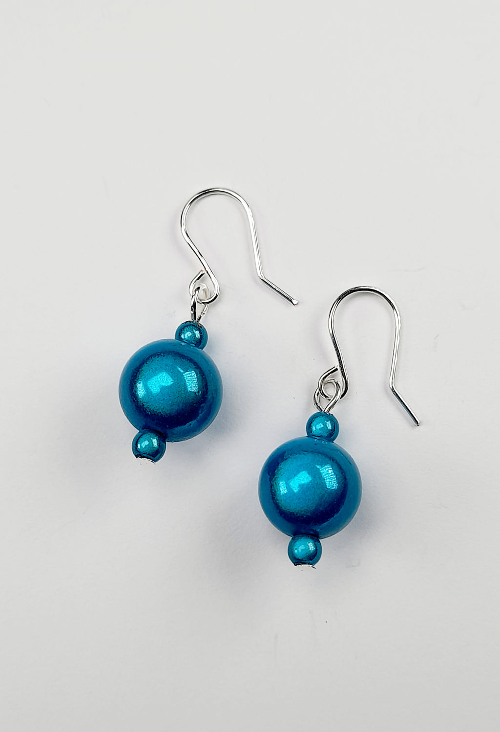 Handmade Silver Dangle Earrings with Turquoise Luminescent Beads