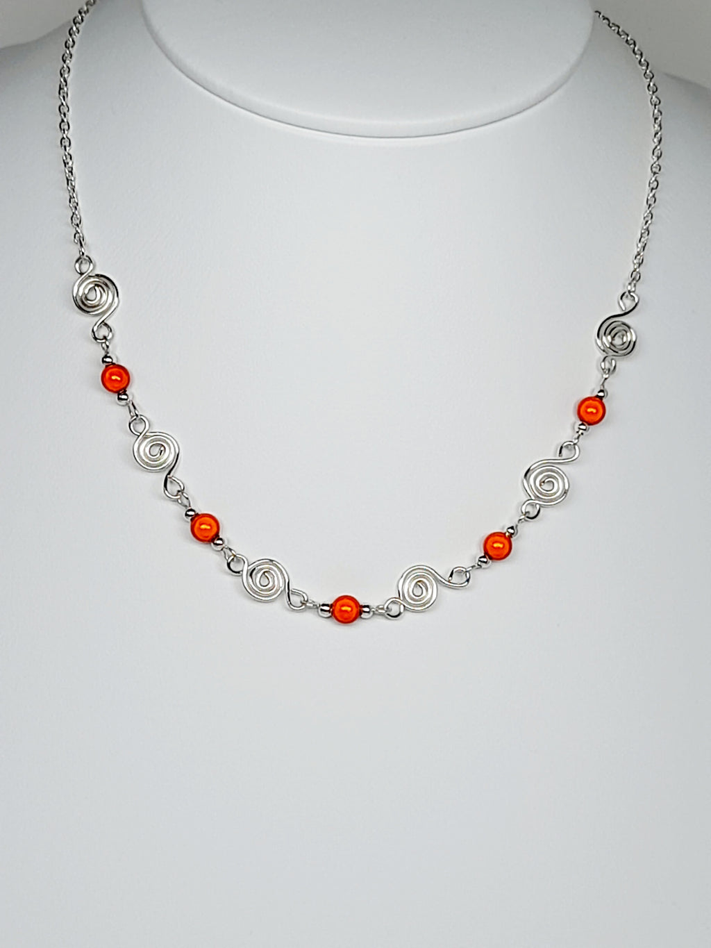 Dainty Silver Spiral Necklace with Orange Miracle Beads,  Handmade Lightweight Jewellery