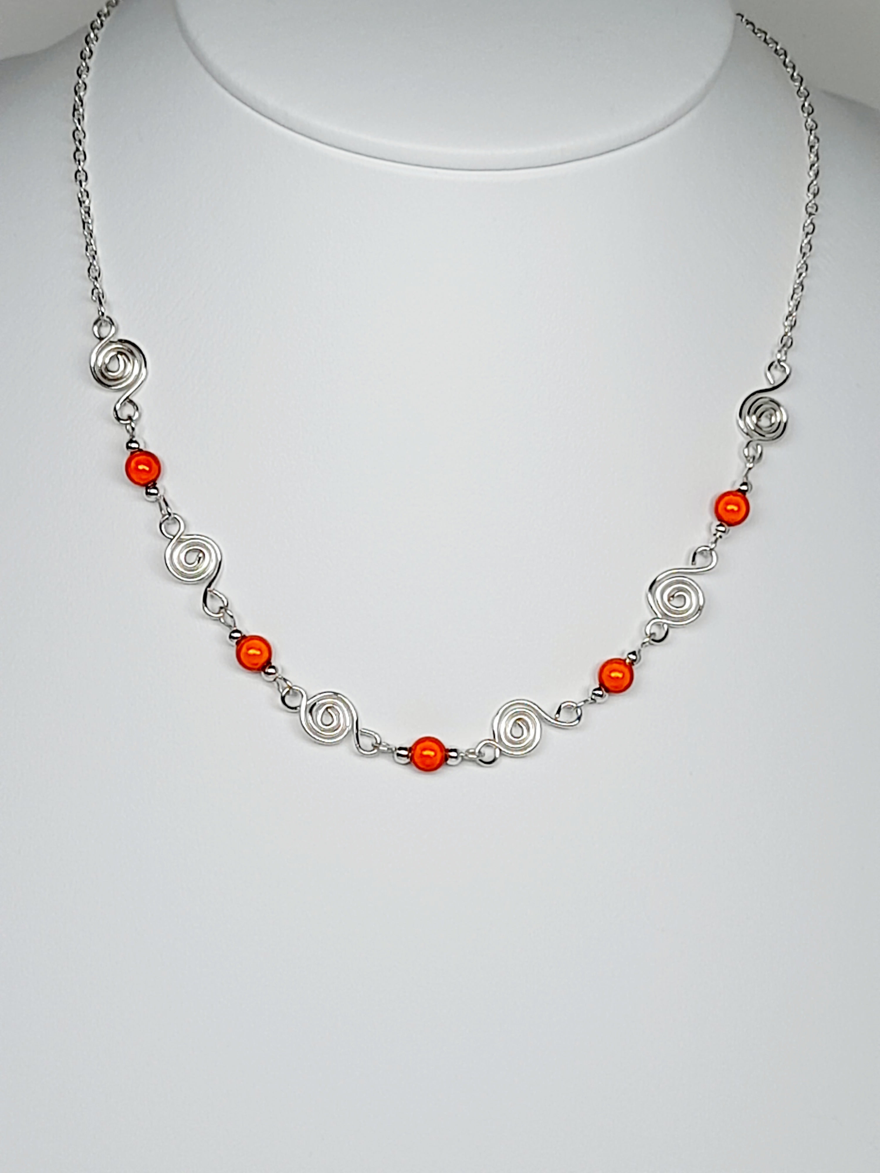 Dainty Silver Spiral Necklace with Orange Miracle Beads,  Handmade Lightweight Jewellery