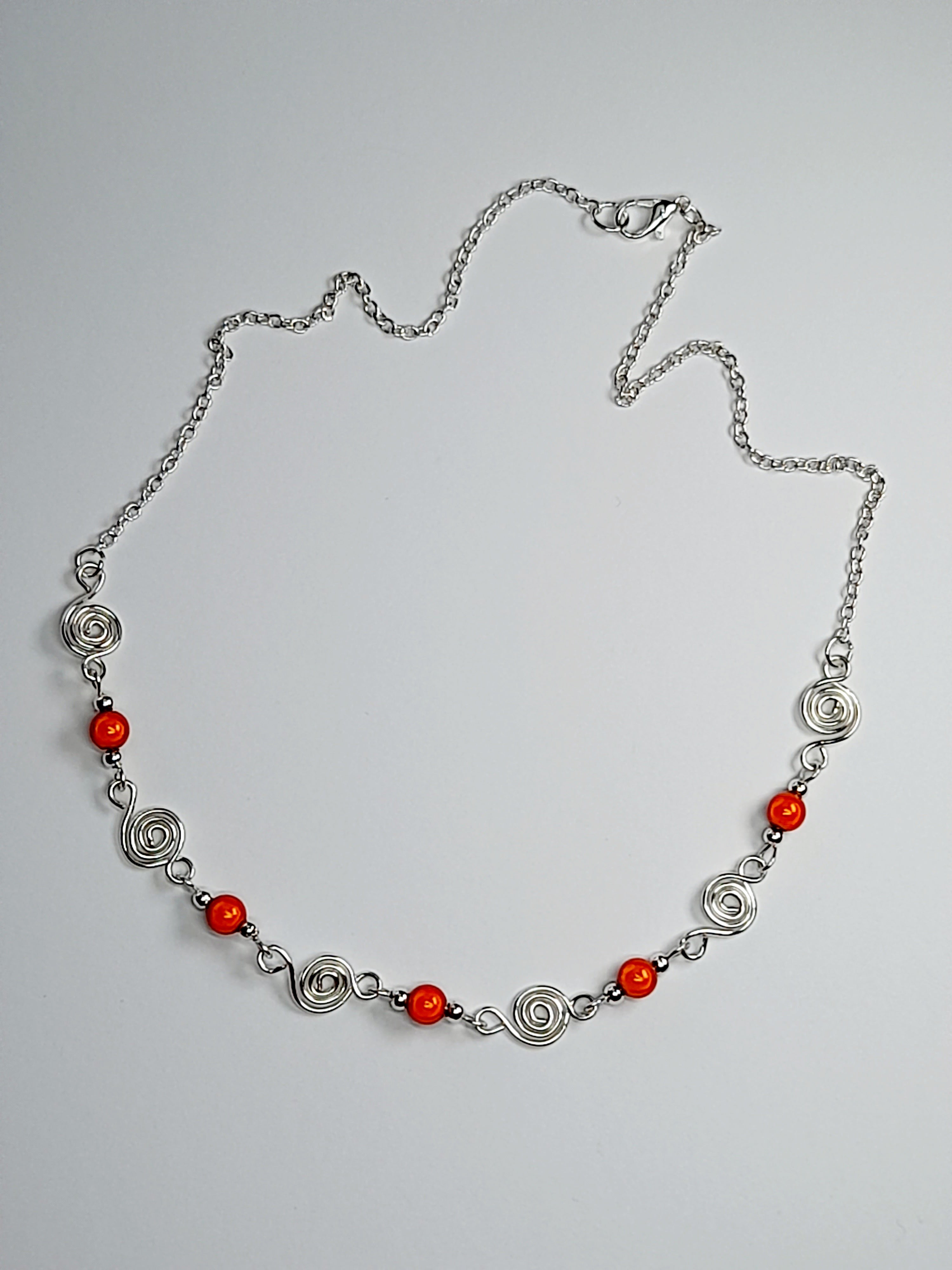 Dainty Silver Spiral Necklace with Orange Miracle Beads,  Handmade Lightweight Jewellery