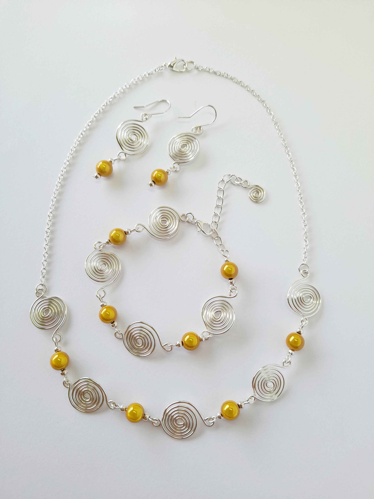 Silver Spiral & Yellow Bead Necklace – Handmade Design