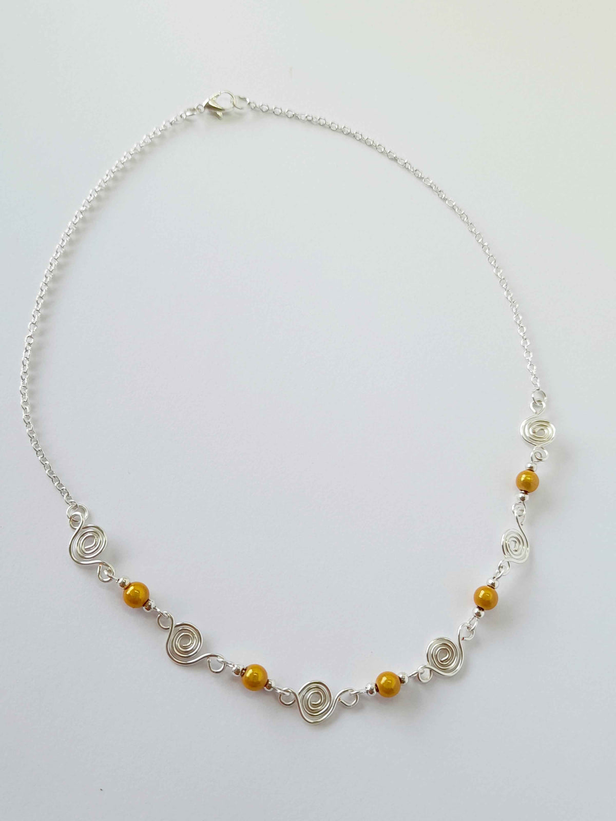 Dainty Silver Spiral & Yellow Bead Necklace – Handmade Design