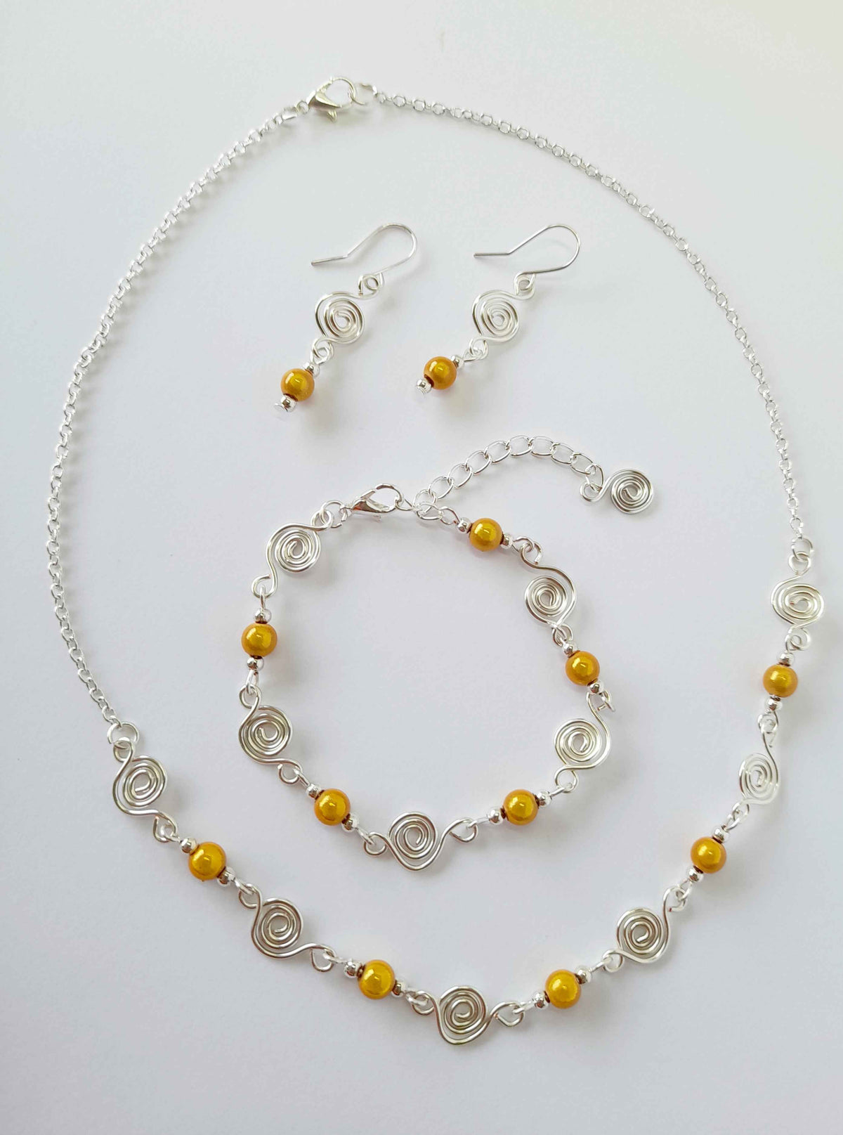 Dainty Silver Spiral & Yellow Bead Necklace – Handmade Design