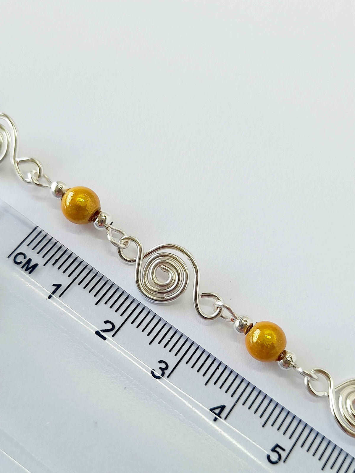 Dainty Silver Spiral & Yellow Bead Bracelet – Handmade Adjustable Design