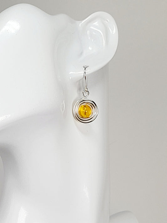 Handmade Silver Swirl Drop Earrings with Yellow Miracle Bead
