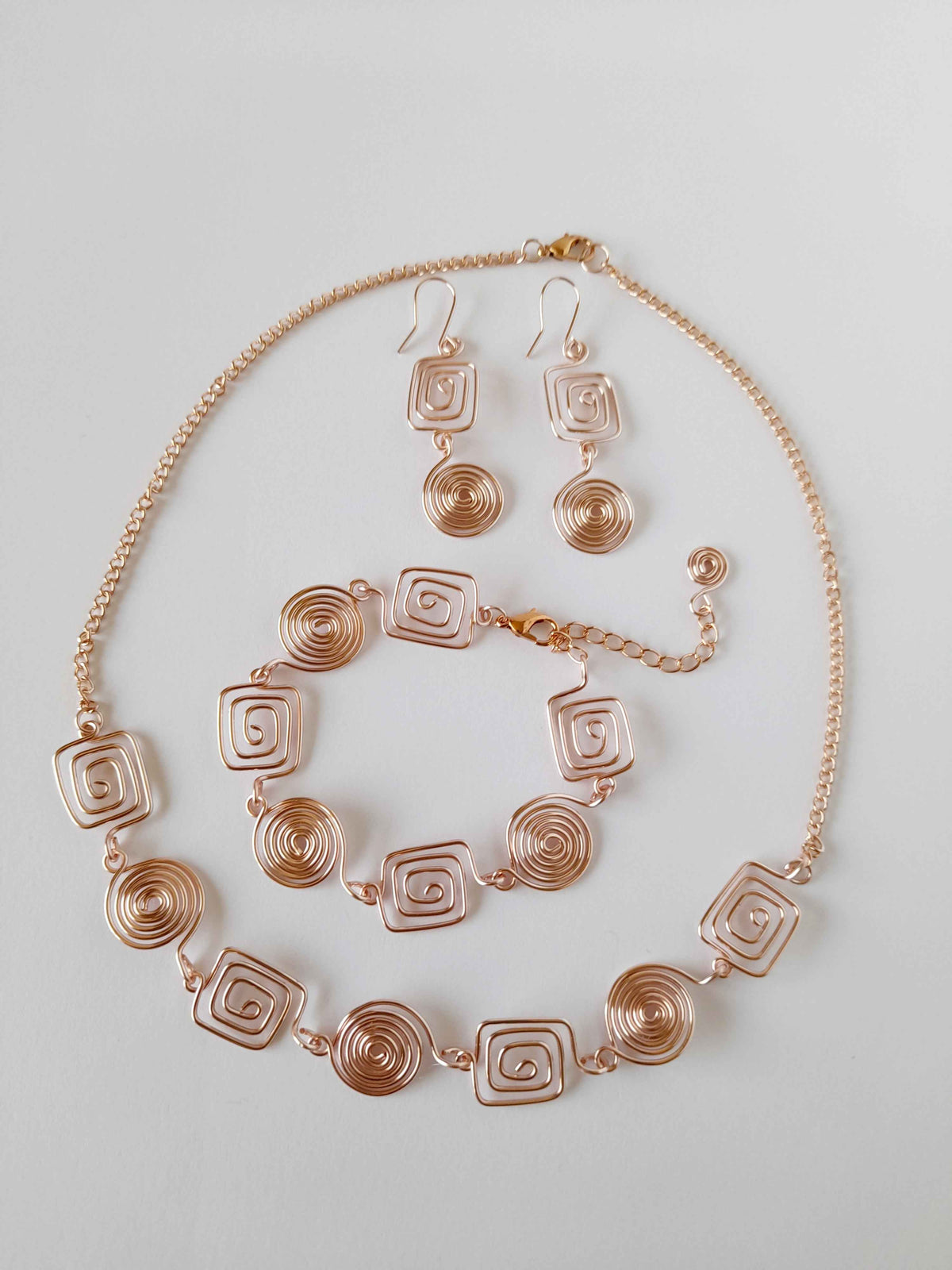 Rose Gold Geometric Double Spiral Drop Earrings
