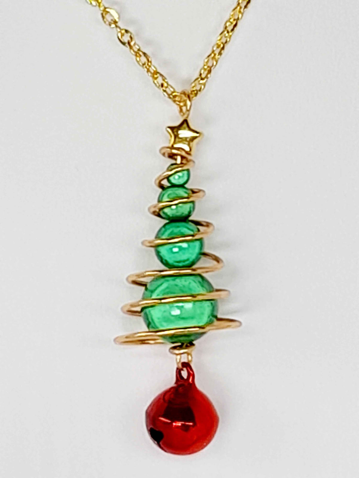 Green Miracle Bead Christmas Tree Necklace with Gold Wire and Red Jingle Bell