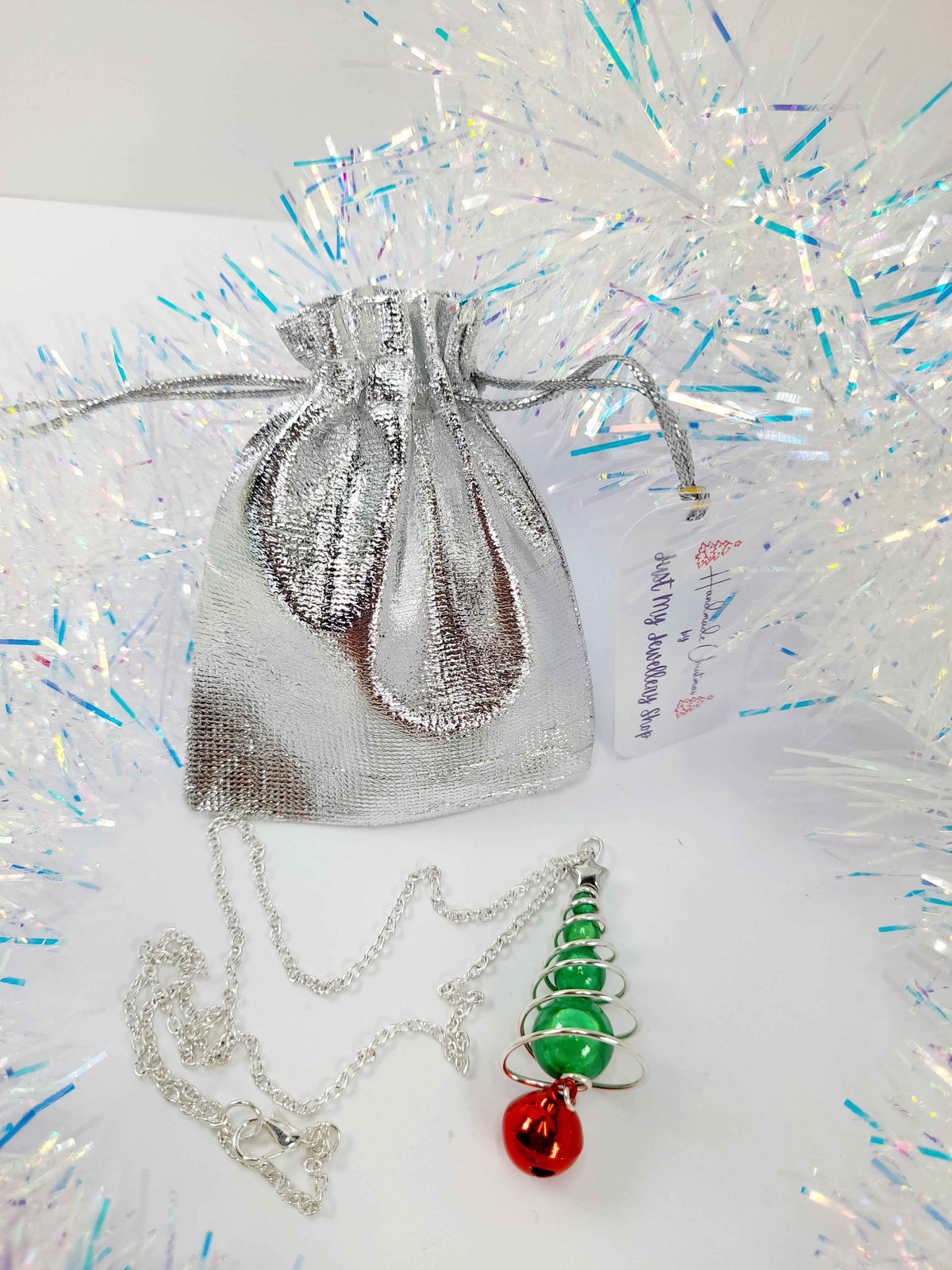 Green Miracle Bead Christmas Tree Necklace with Red Jingle Bell