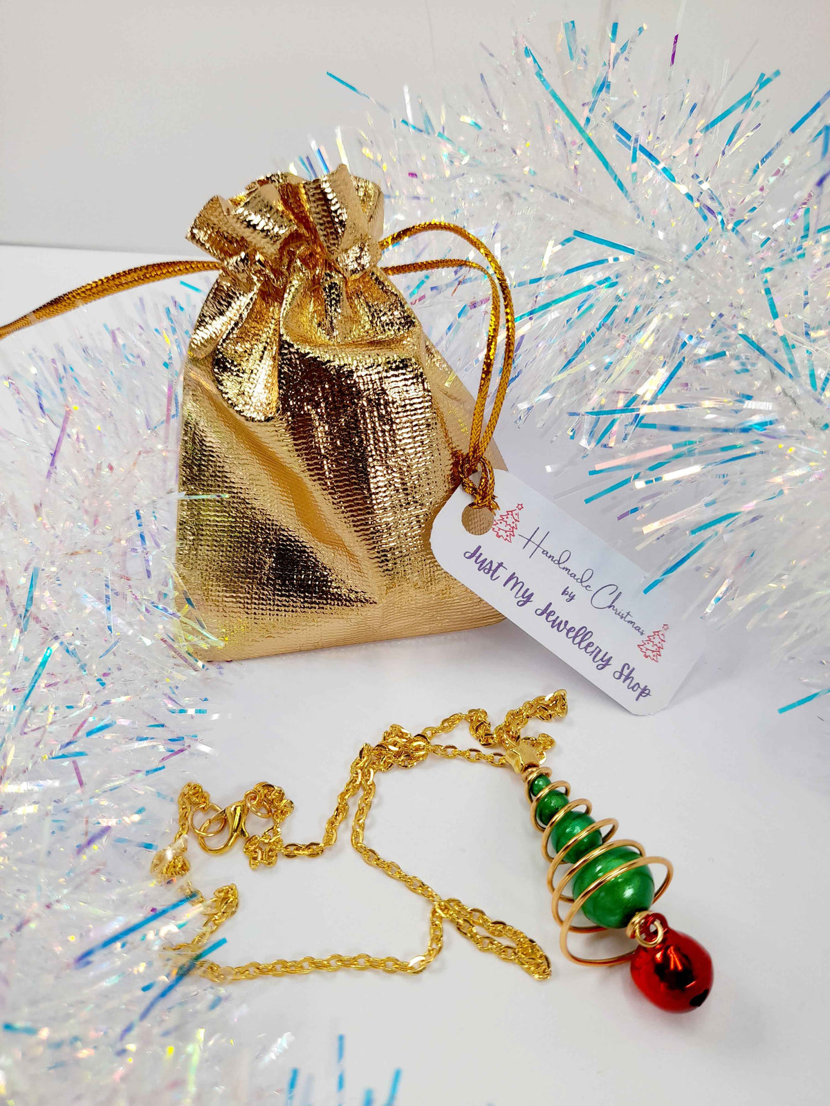 Green Miracle Bead Christmas Tree Necklace with Gold Wire and Red Jingle Bell